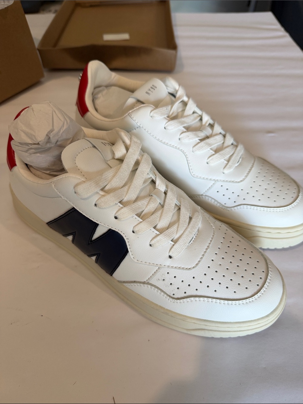Steve Madden White Leather Sneakers with Navy 'M' and Red Heel Tab